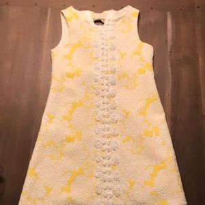 A cute lace yellow bow dress